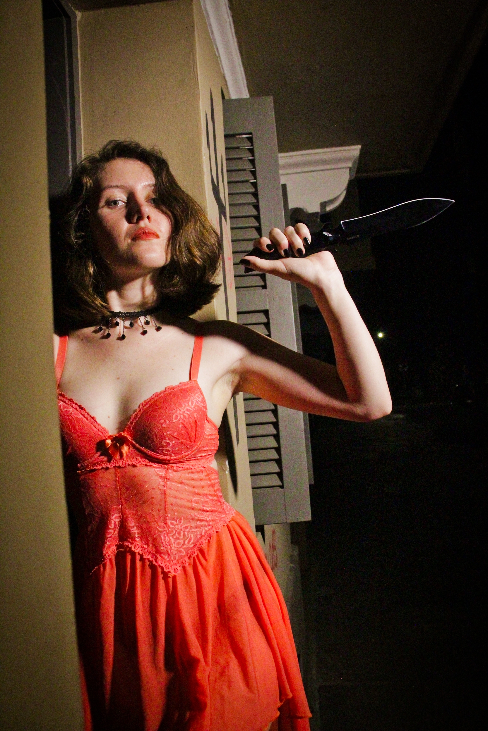 Hey Ellie in beautiful photoshoot with a knife